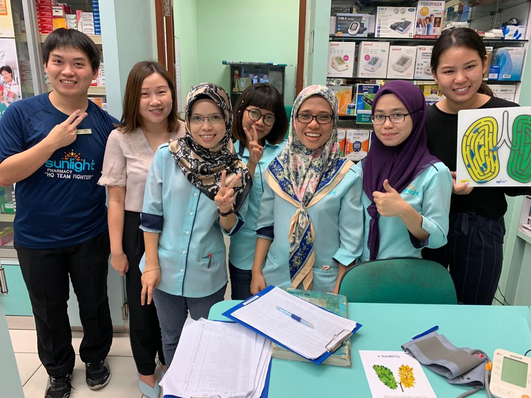 A group of pharmacists with EP Plus Group product consultant