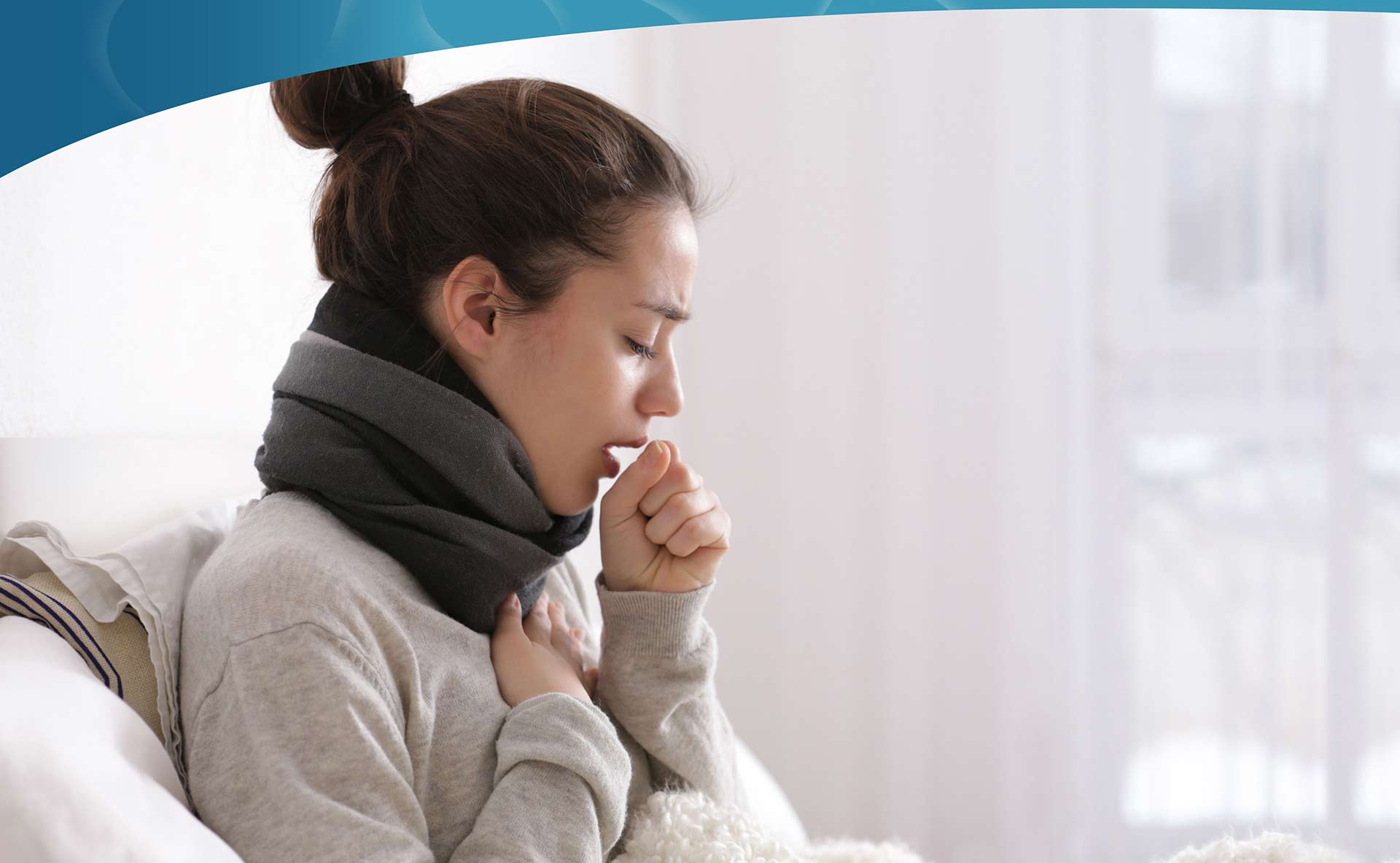 A lady coughing badly